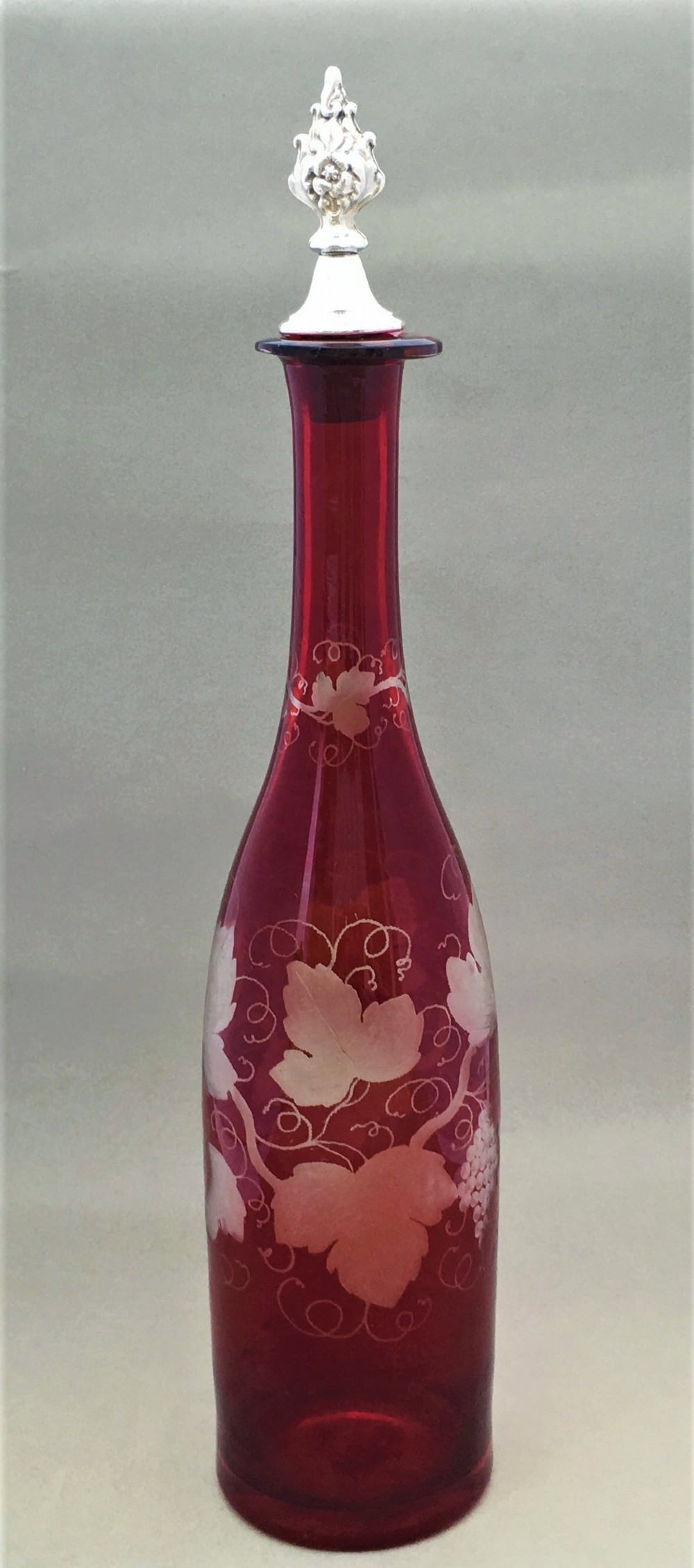 A Charming Victorian fruiting vine etched decanter with silver plated stopper
