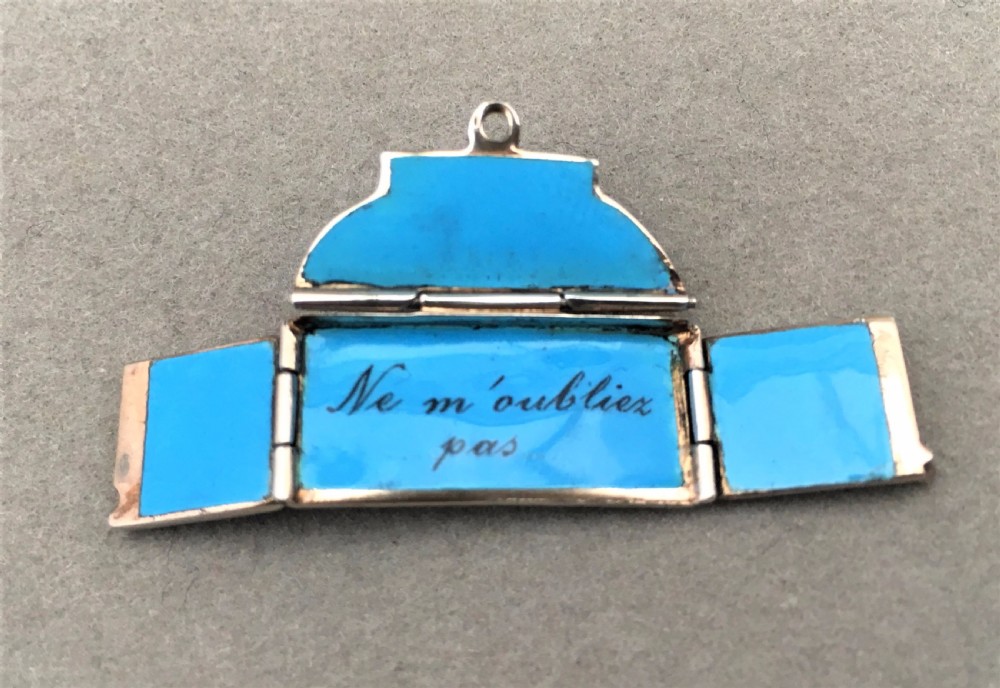 A delightful miniature French silver and enamel sweetheart charm View V