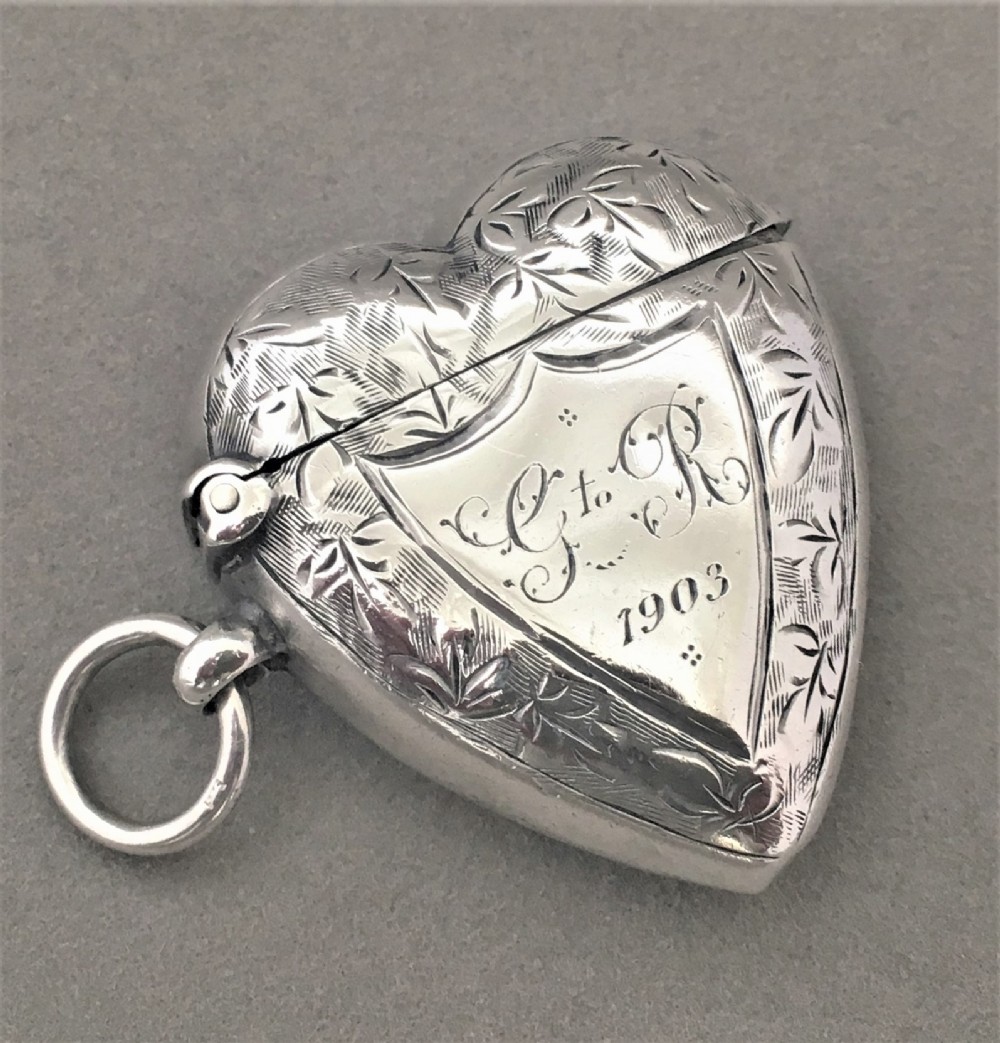 A Rare & unusual heart shaped silver vesta