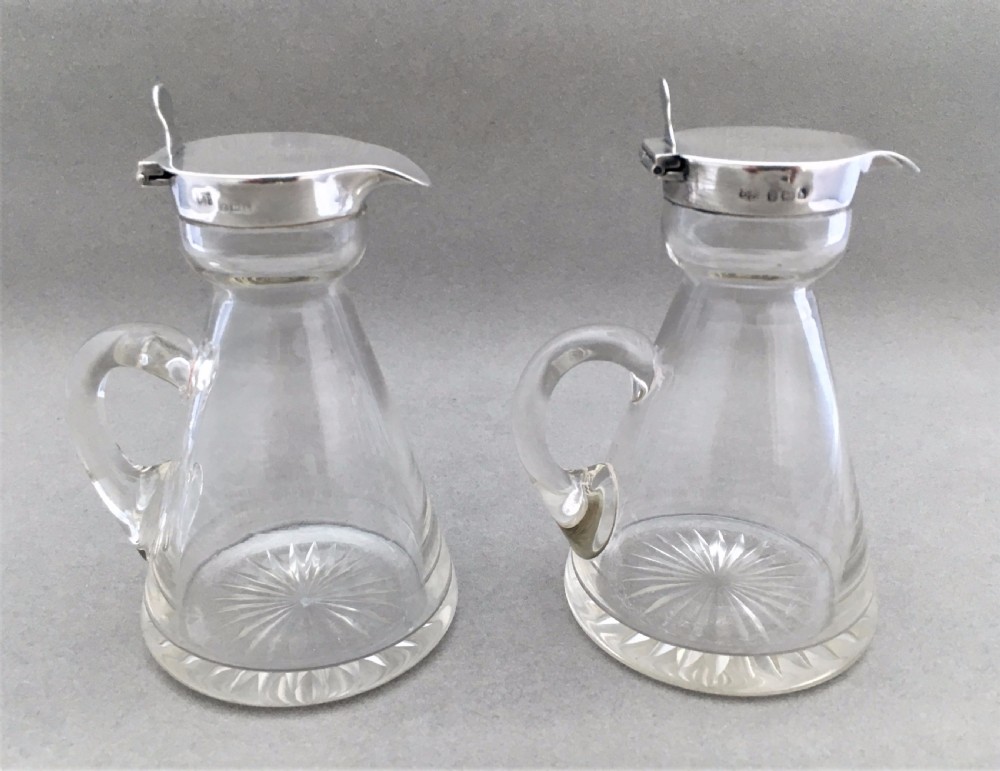 A pair of silver mounted Brandy & Whisky Noggins View VIII