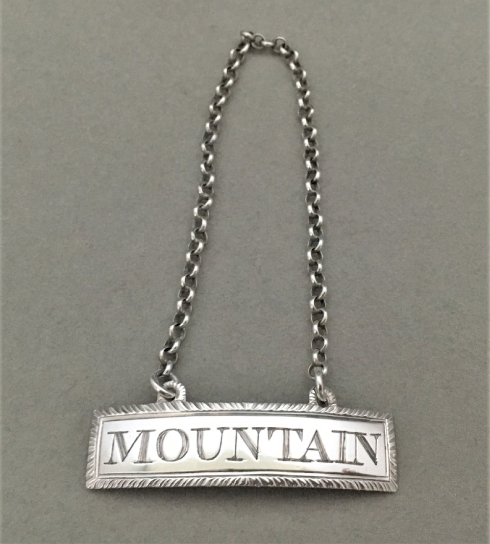 A Rare 18th Century silver Mountain label - Female silversmith