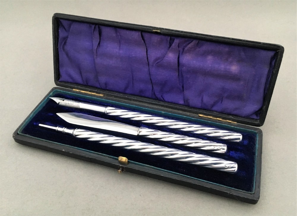 A boxed silver writing set assayed in Chester