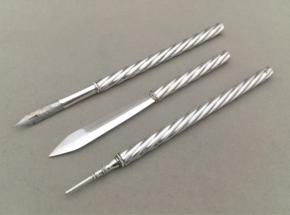 A boxed silver writing set assayed in Chester View III