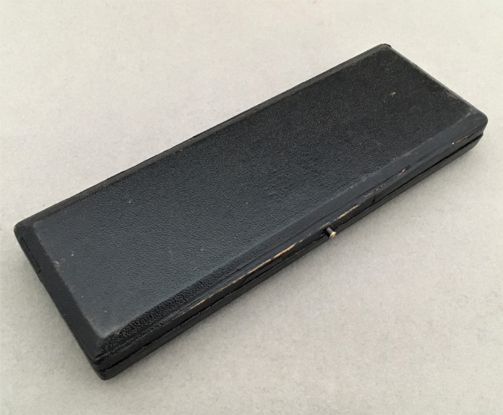 A boxed silver writing set assayed in Chester View IX