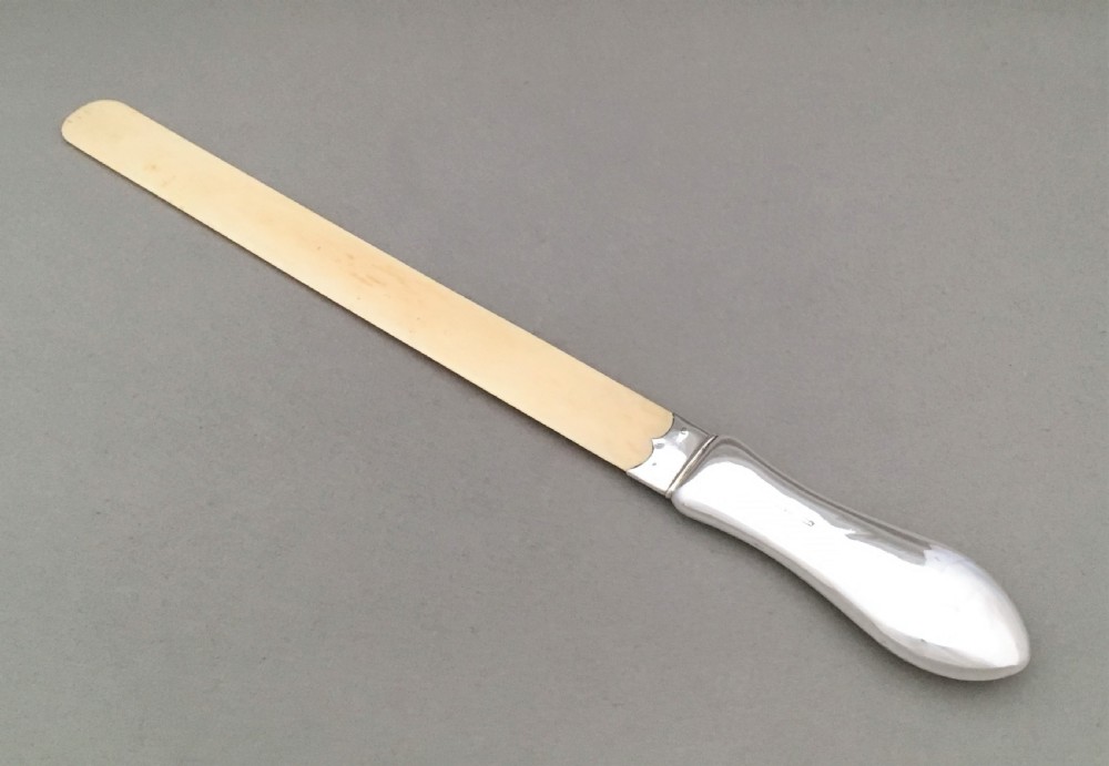 A handsome silver and ivory Edwardian page turner