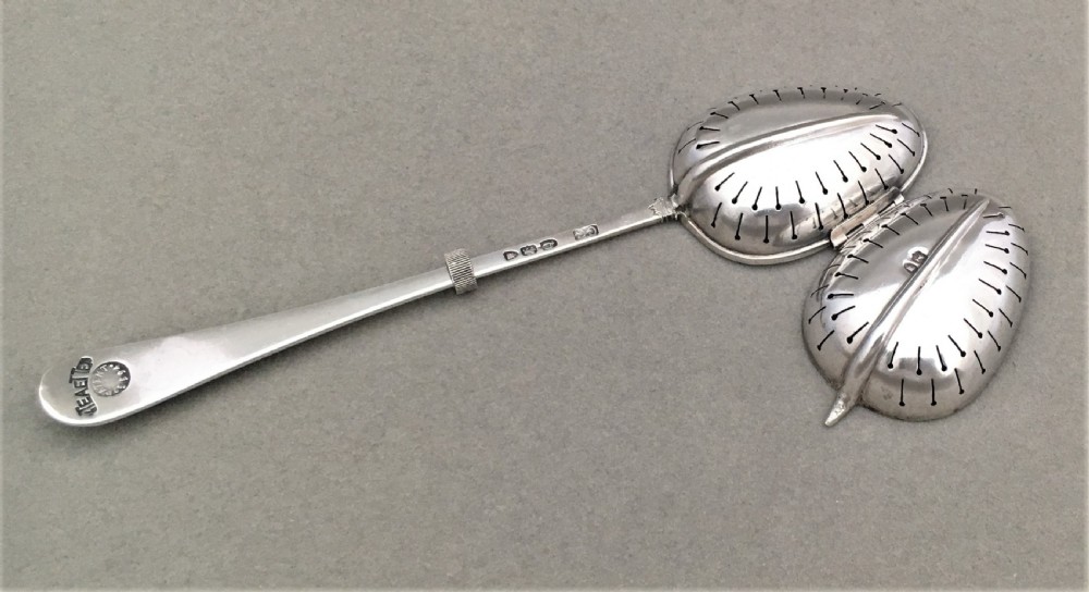 A Victorian silver 'Teaette' tea infuser View VI