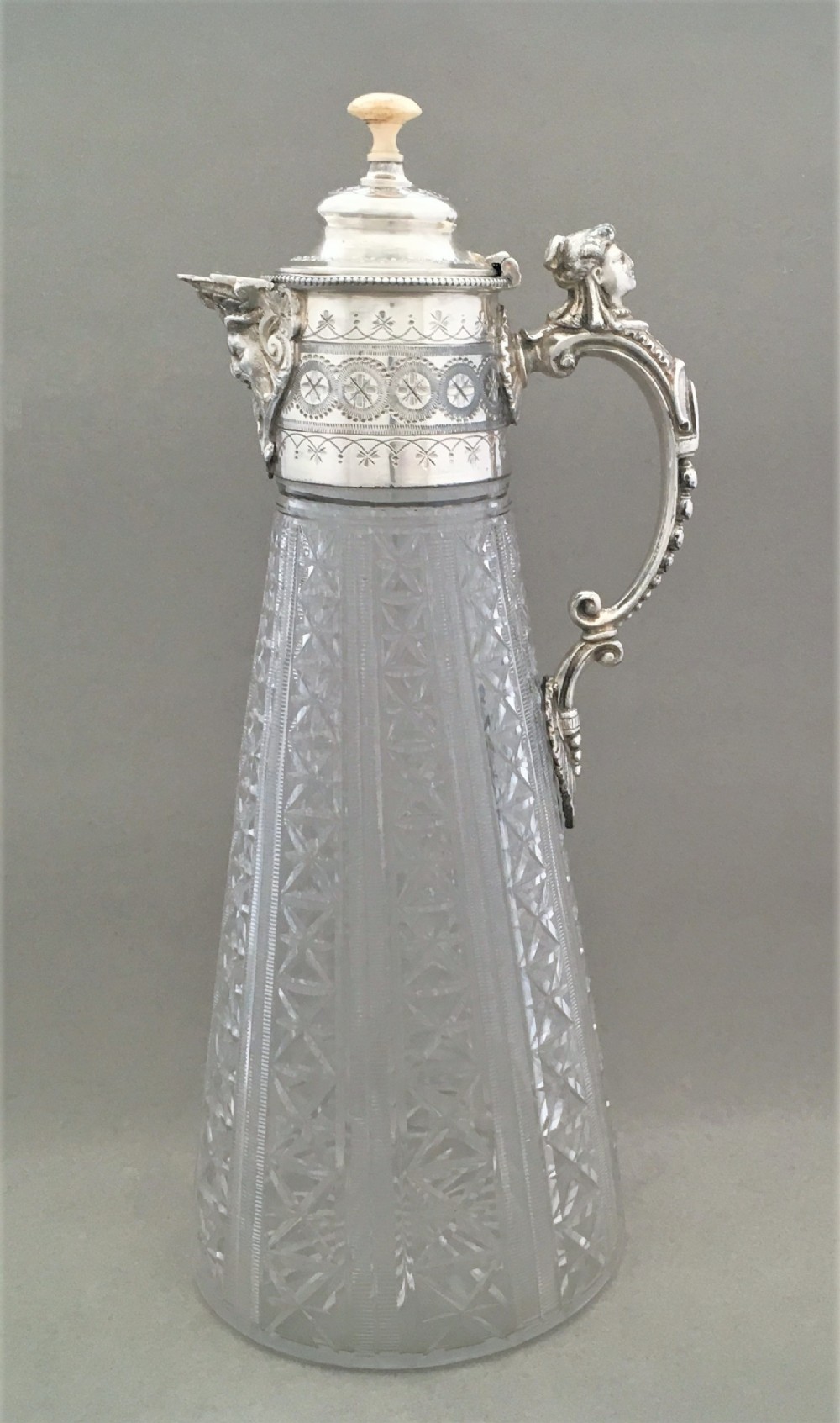 An attractive Victorian silver plate claret jug