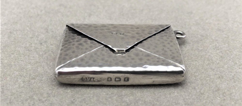 A lovely Arts & Crafts silver stamp case View III