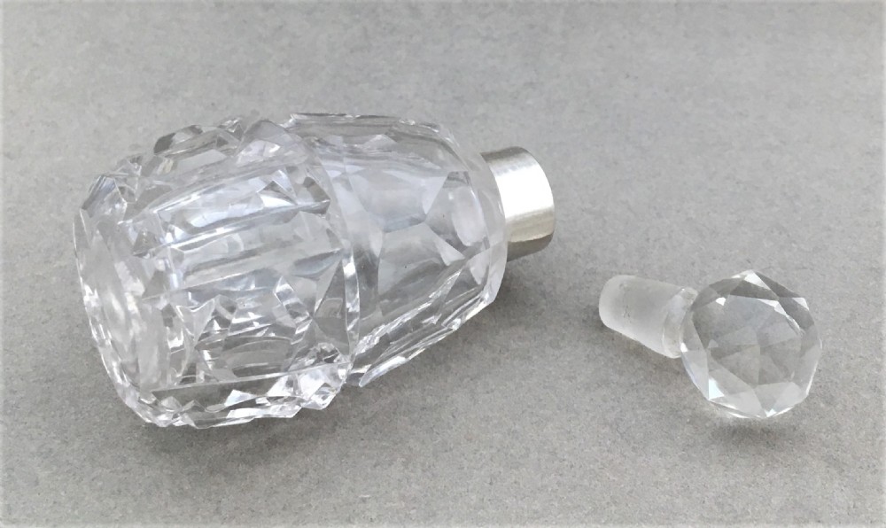 A charming silver mounted cut glass scent bottle View III