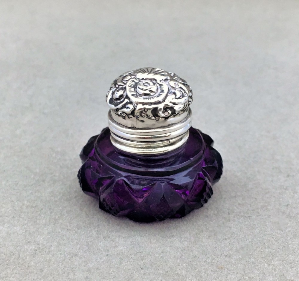 An exquisite silver mounted amethyst vinaigrette