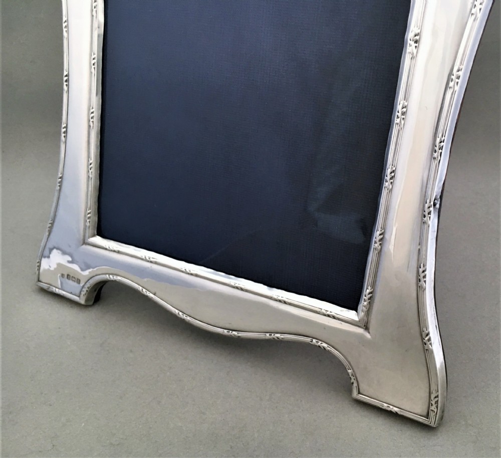 A decorative shaped silver photo frame View VI