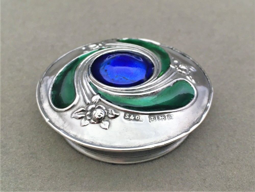 A gorgeous silver & enamel vanity jar View V