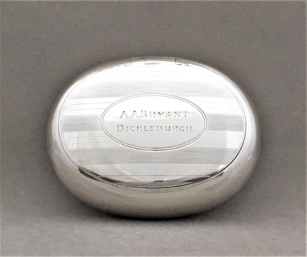 A charming Edwardian silver oval tobacco box View IV