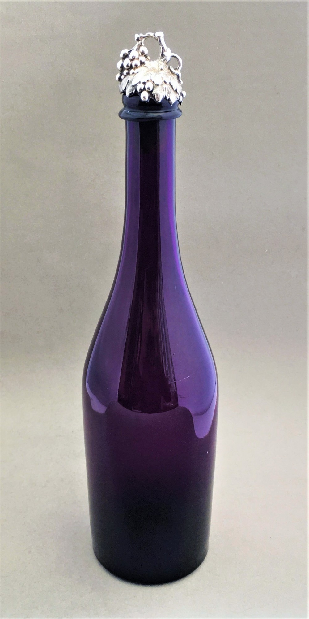 A beautiful Victorian amethyst & silver mounted decanter