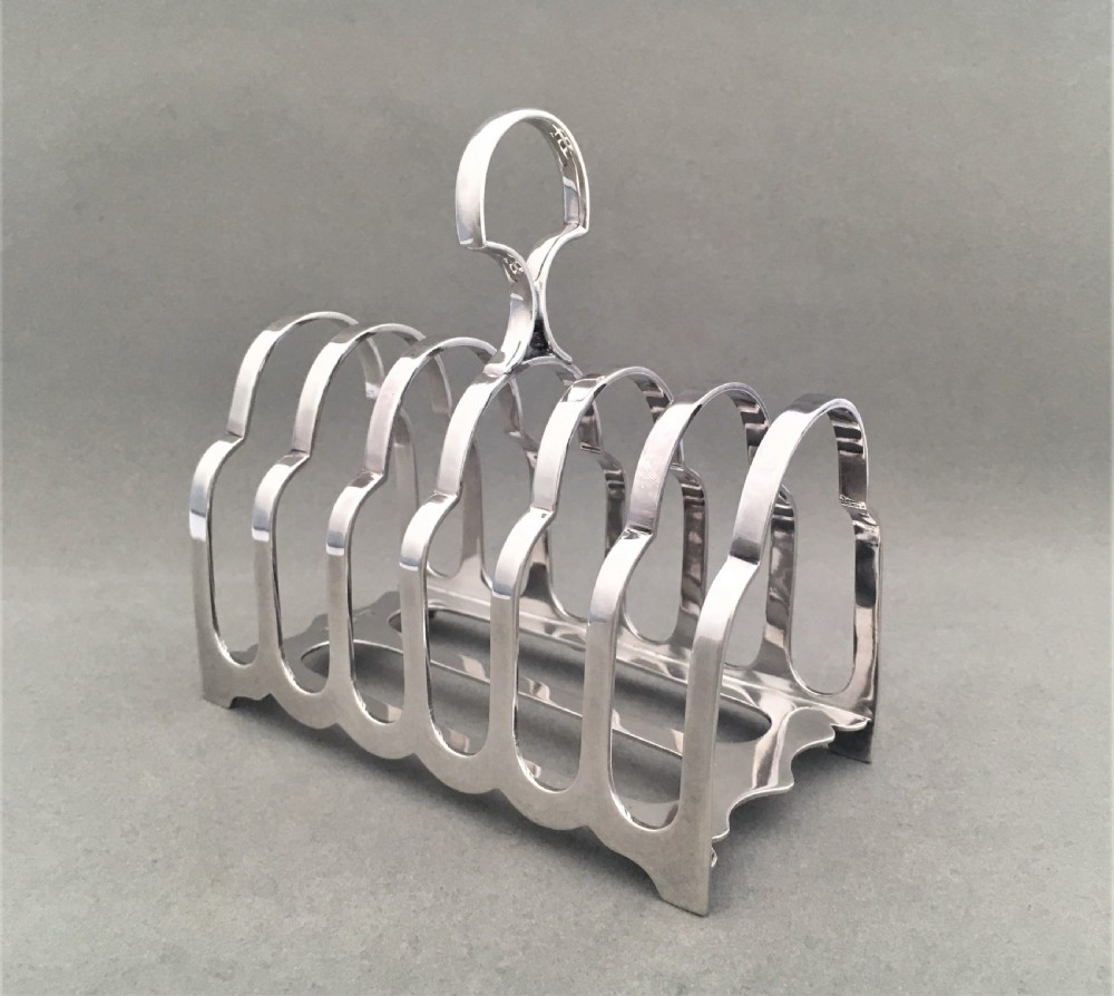 A Victorian six slice silver toast rack