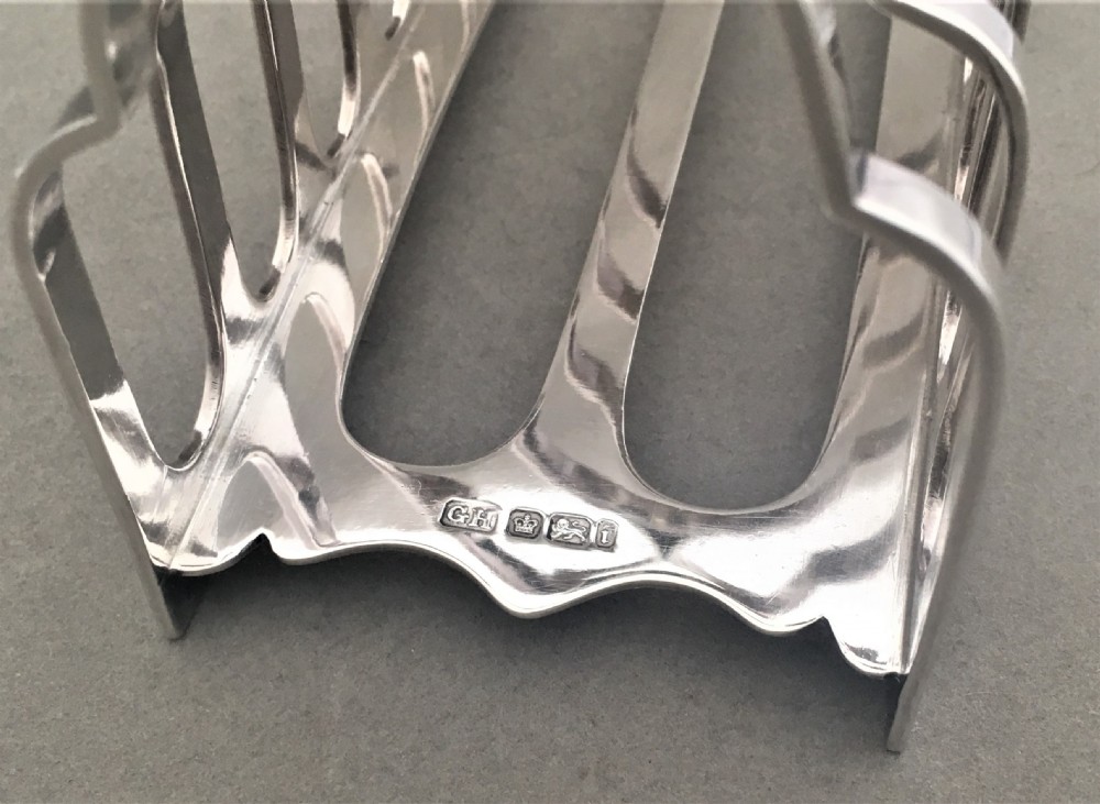 A Victorian six slice silver toast rack View III