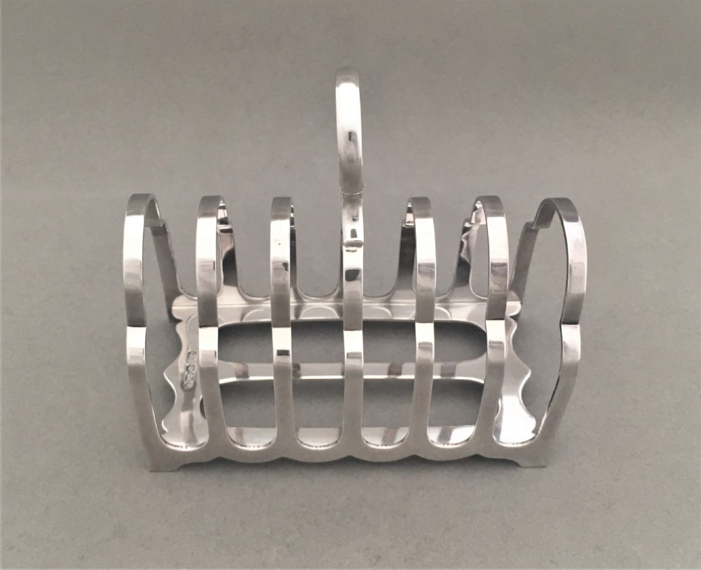A Victorian six slice silver toast rack View IV