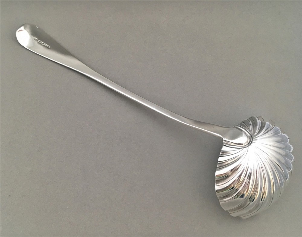A superb George III silver shell bowl soup ladle View III