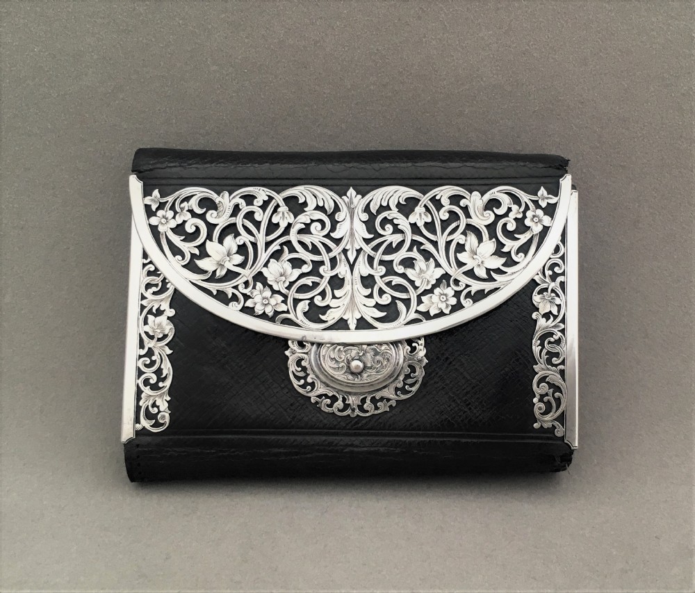 An exquisite silver mounted leather purse