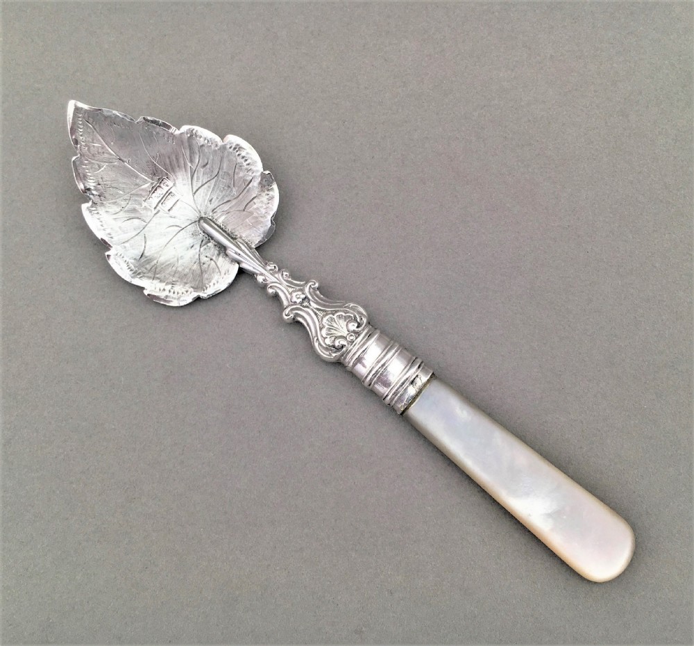An Edwardian silver naturalistic preserve spoon