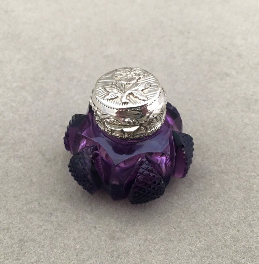 A fabulous silver mounted amethyst vinaigrette