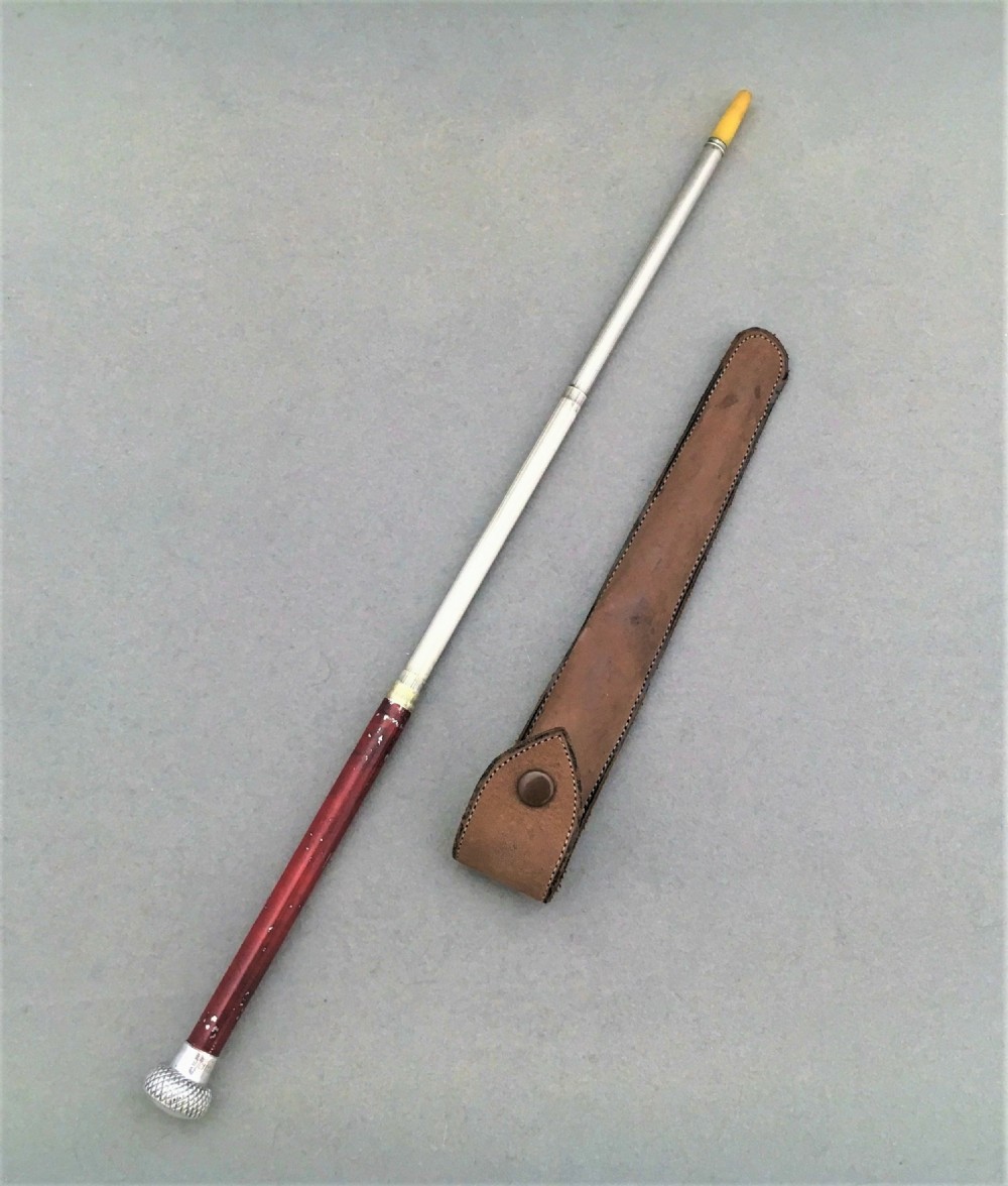 A highly unusual silver mounted telescopic conductors baton
