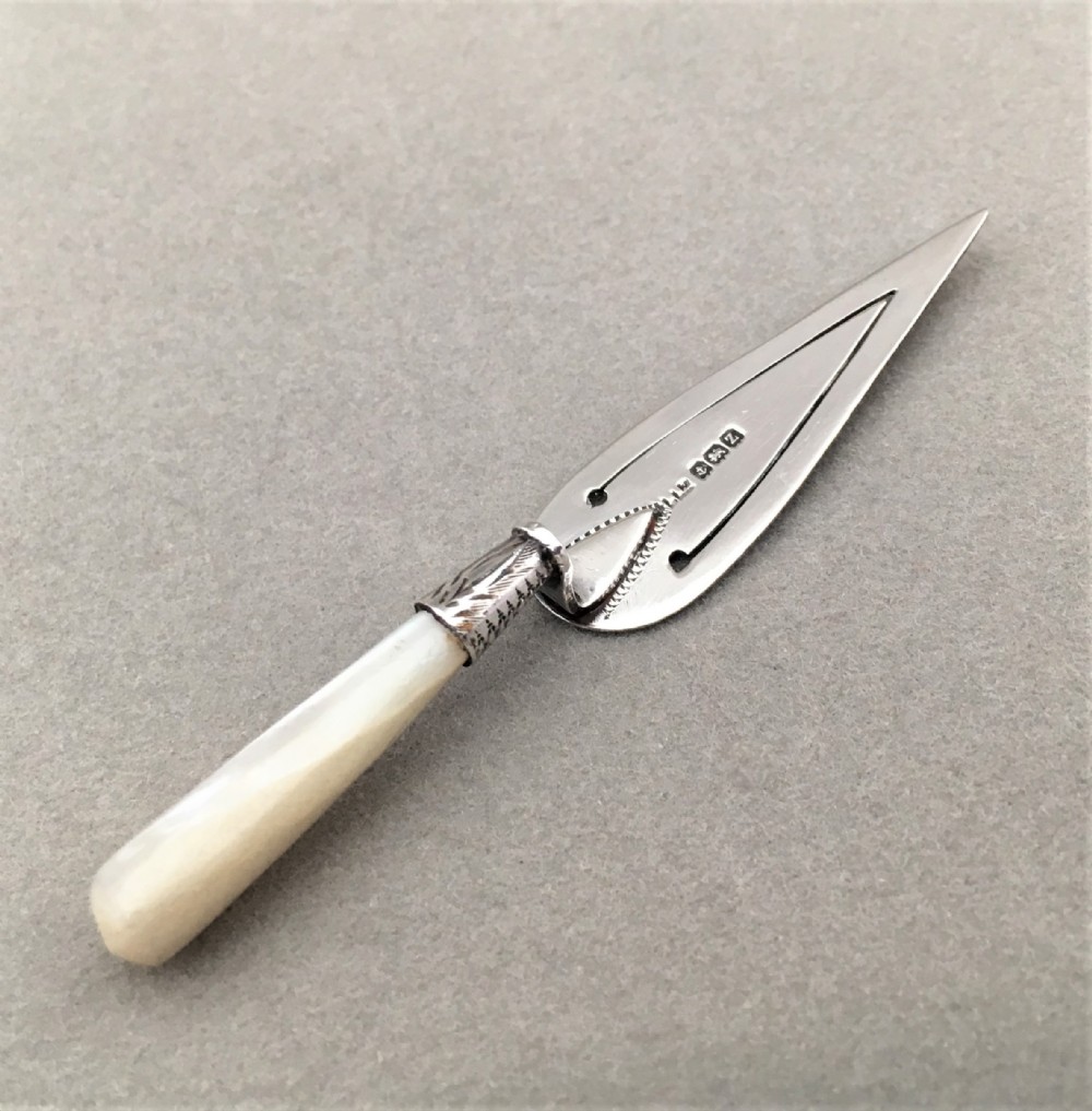 A silver & mother-of-pearl bookmark