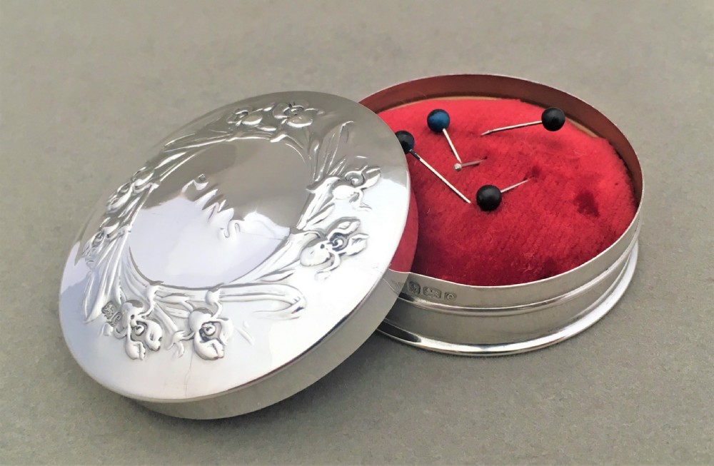 A lovely Edwardian silver pin cushion box