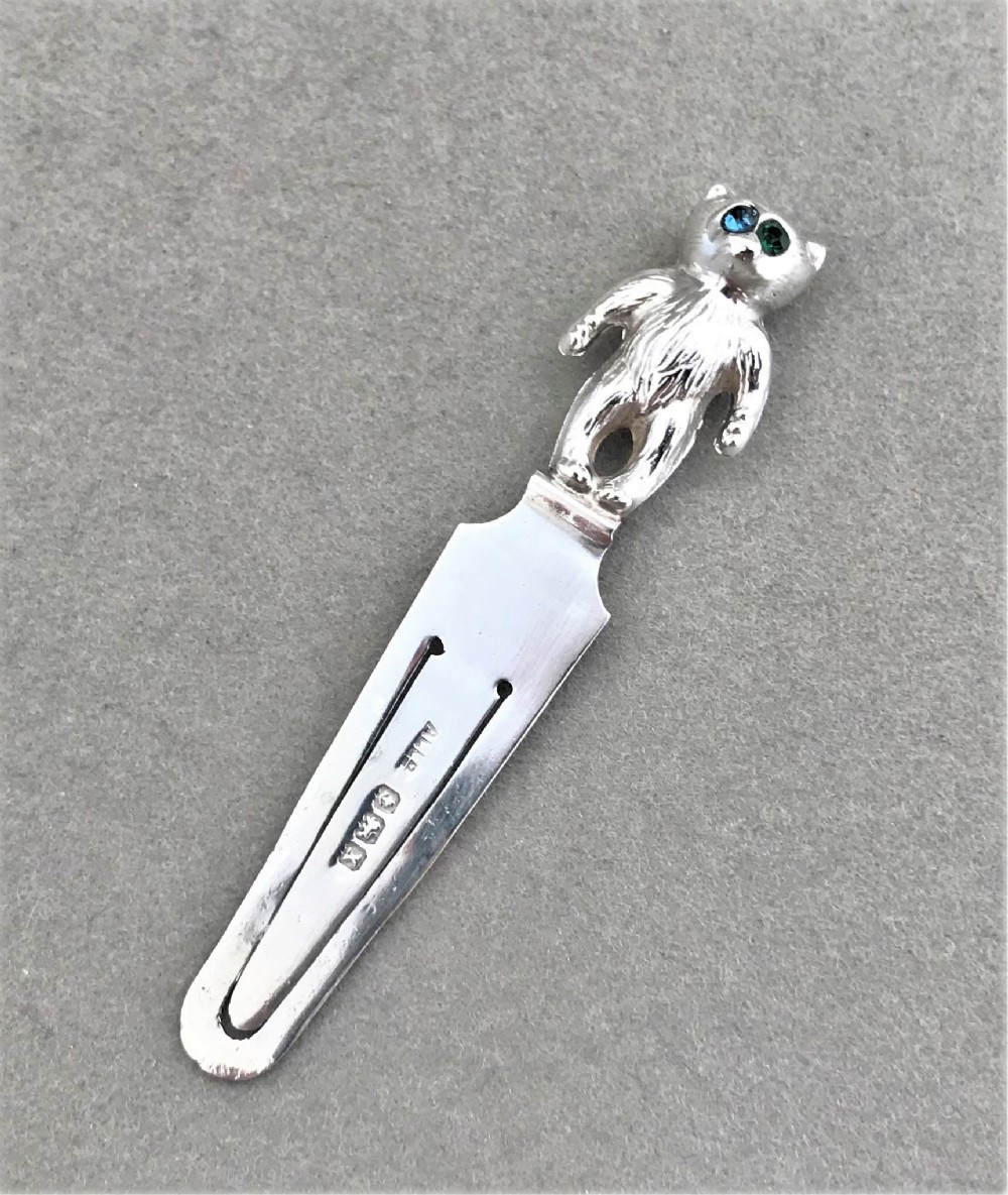 A charming silver bear bookmark