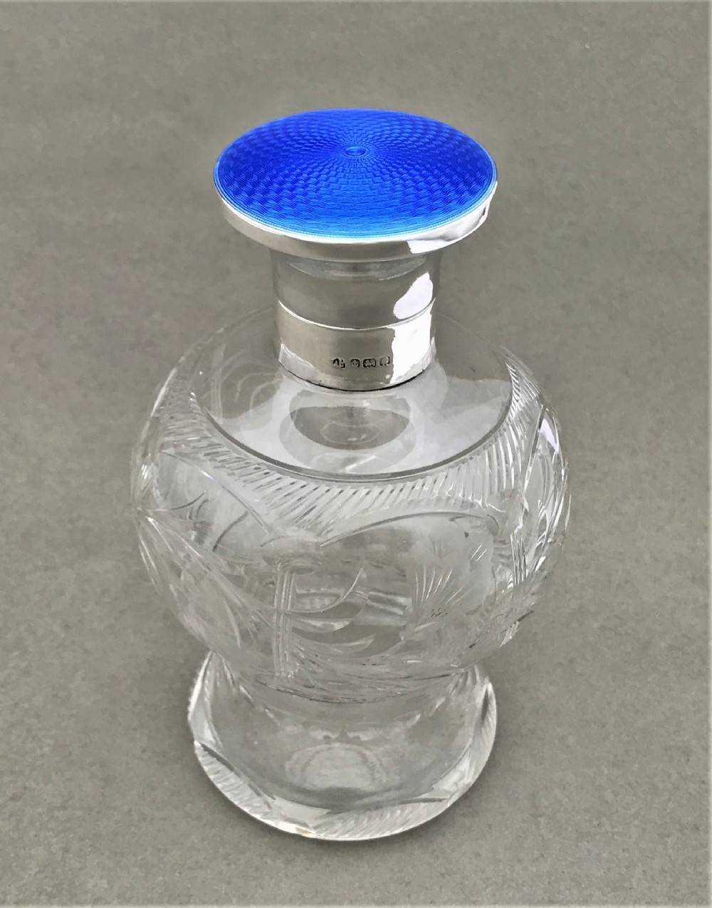 A gorgeous silver & blue guilloche enamel perfume bottle