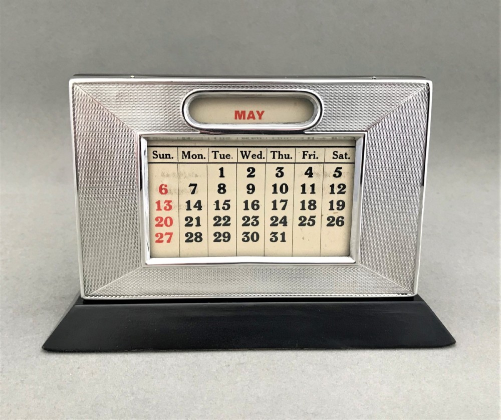 An excellent Art Deco silver desk calendar