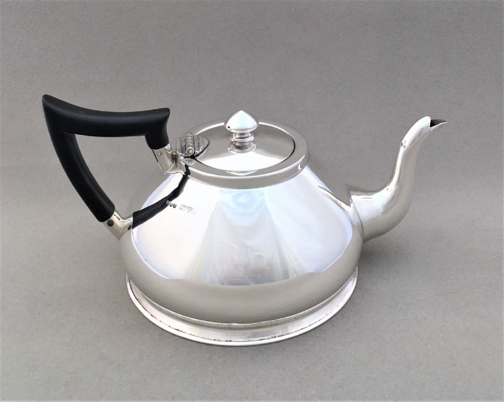 An unusual Chester silver breakfast teapot