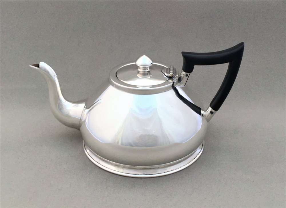 An unusual Chester silver breakfast teapot View II