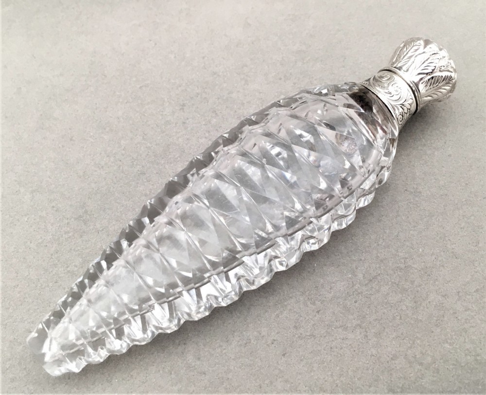 A wonderful silver mounted mid 19th Century scent bottle