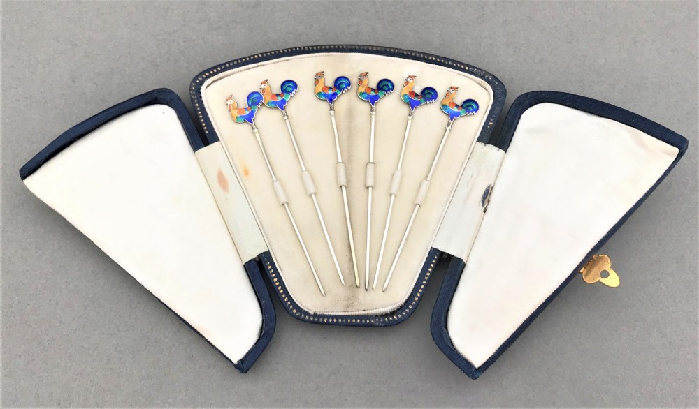 A delightful boxed set of silver & enamel cockerel cocktail sticks