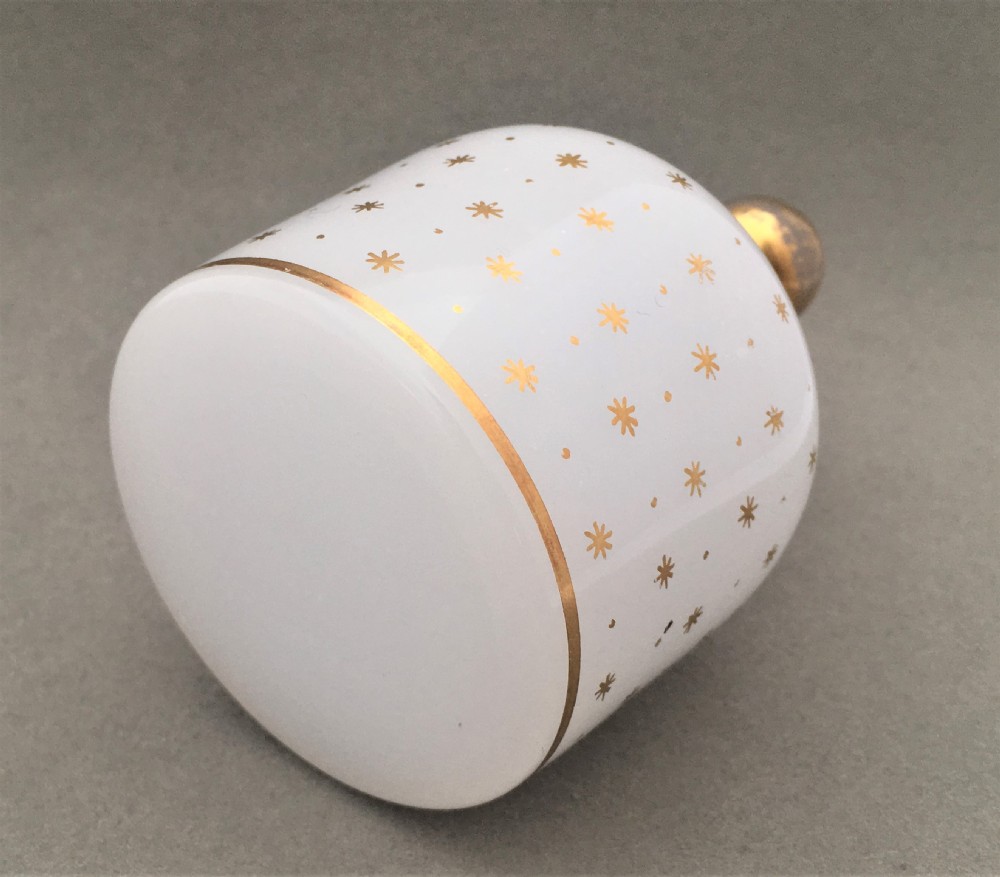 A fabulous star gilded opaline glass cologne bottle View IV