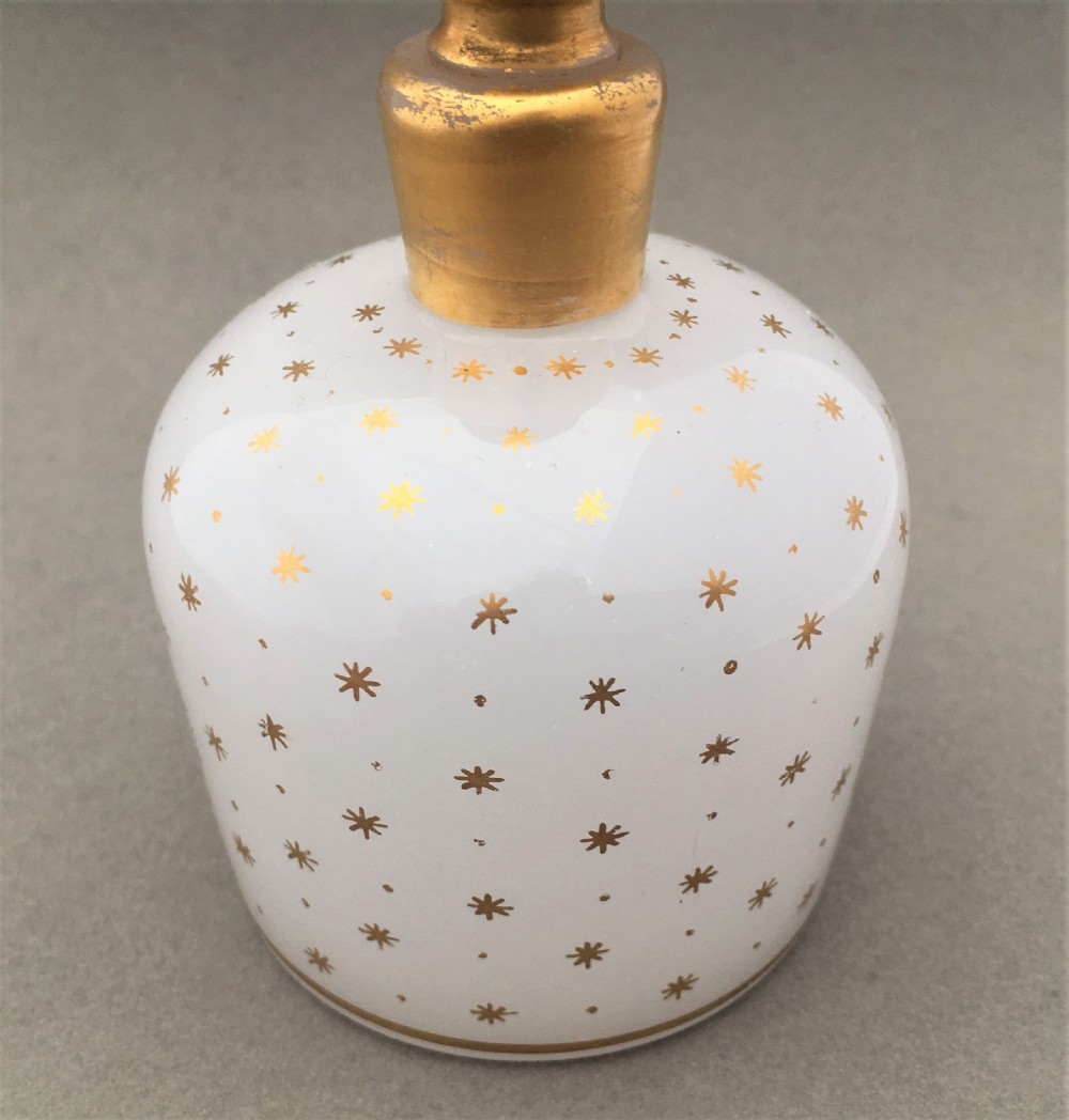 A fabulous star gilded opaline glass cologne bottle View V