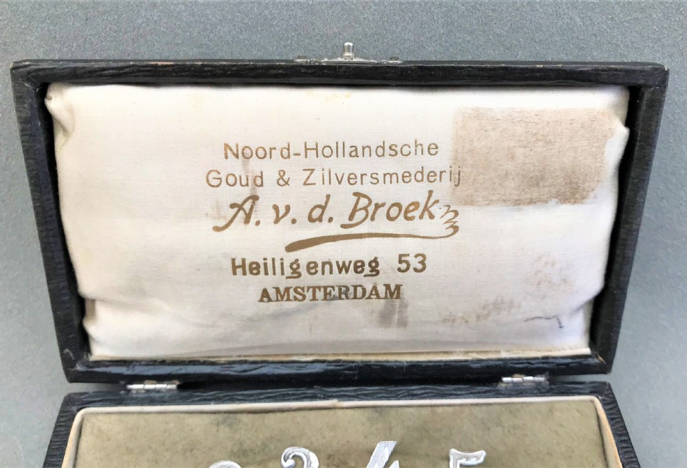 An unusual boxed set of silver party numbers View III