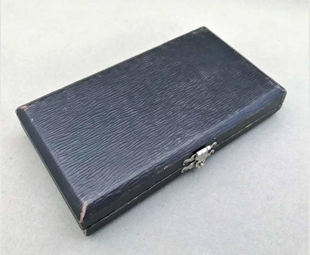 An unusual boxed set of silver party numbers View VII