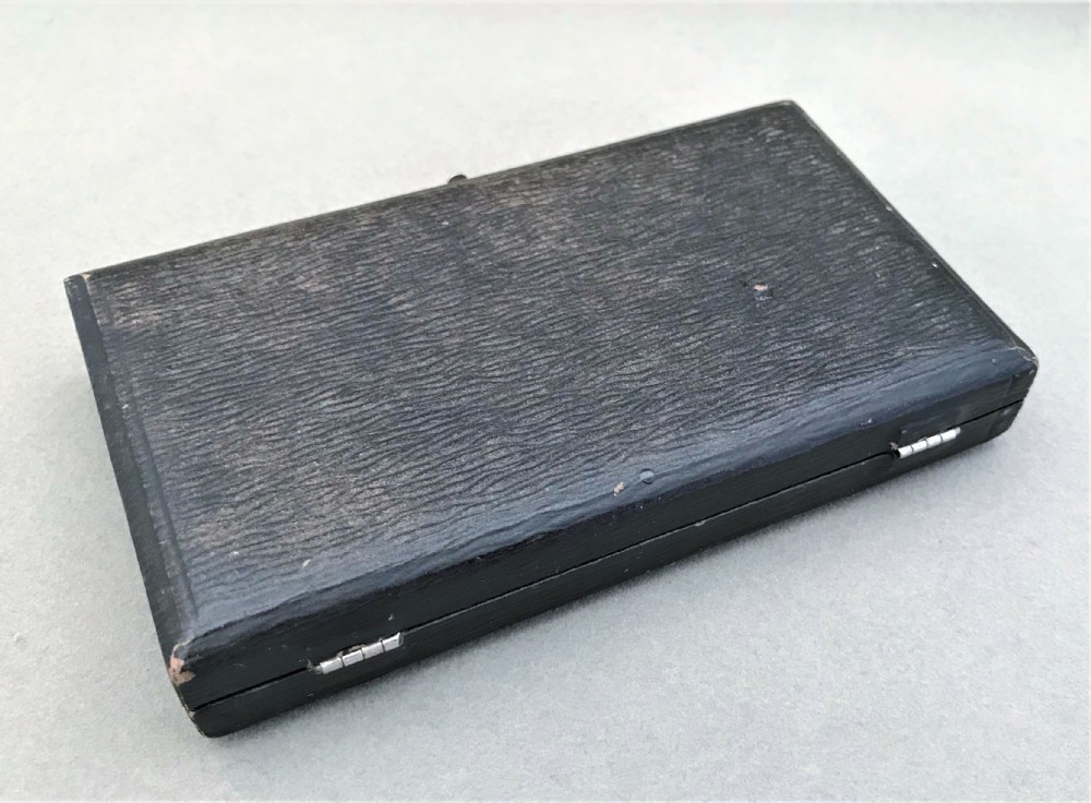 An unusual boxed set of silver party numbers View V