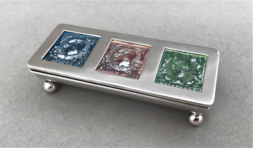 An excellent silver triple stamp box View II