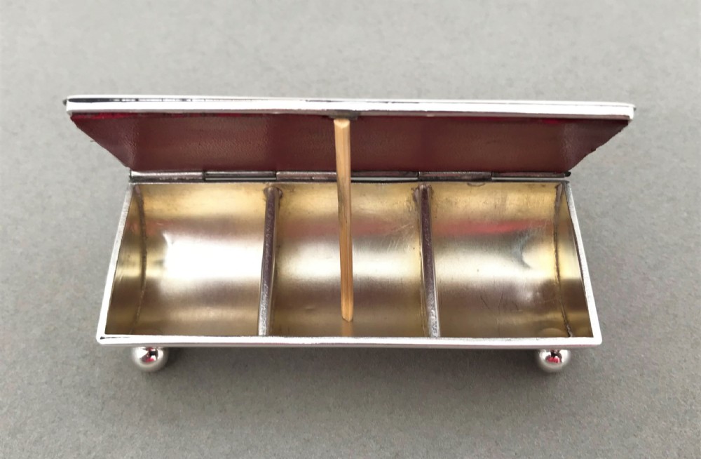 An excellent silver triple stamp box View VII