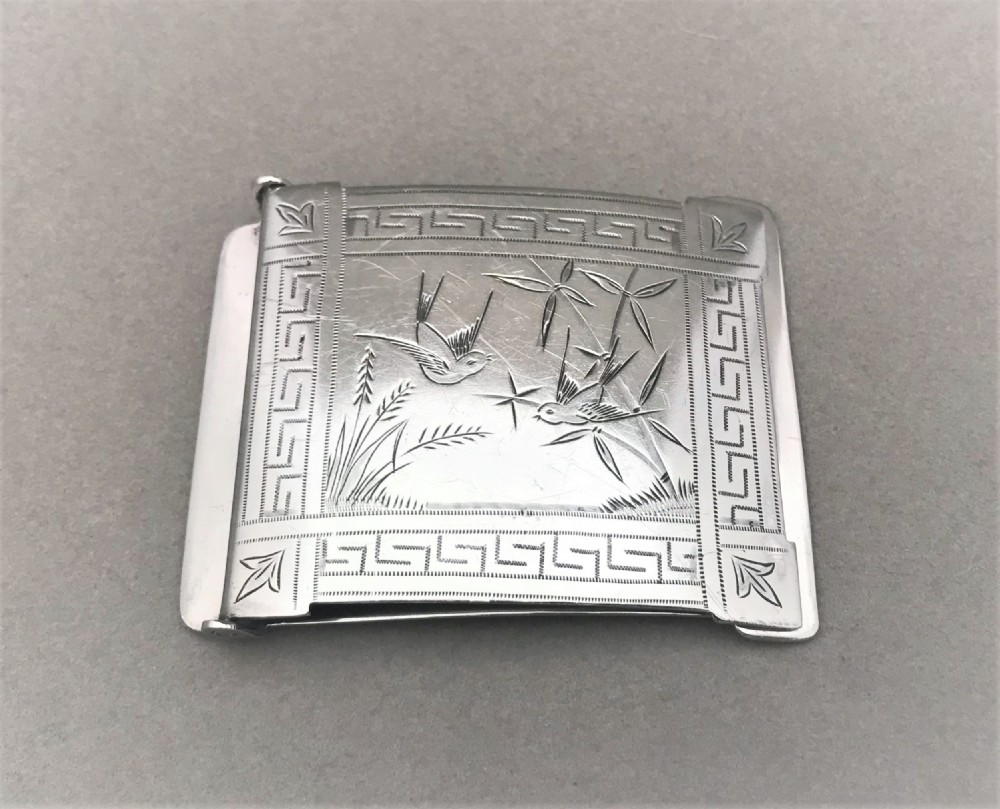 A charming silver plated Aesthetic movement belt buckle