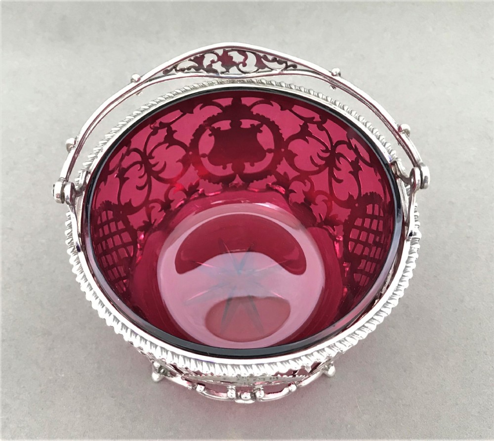 A stunning pierced silver & cranberry glass basket View III