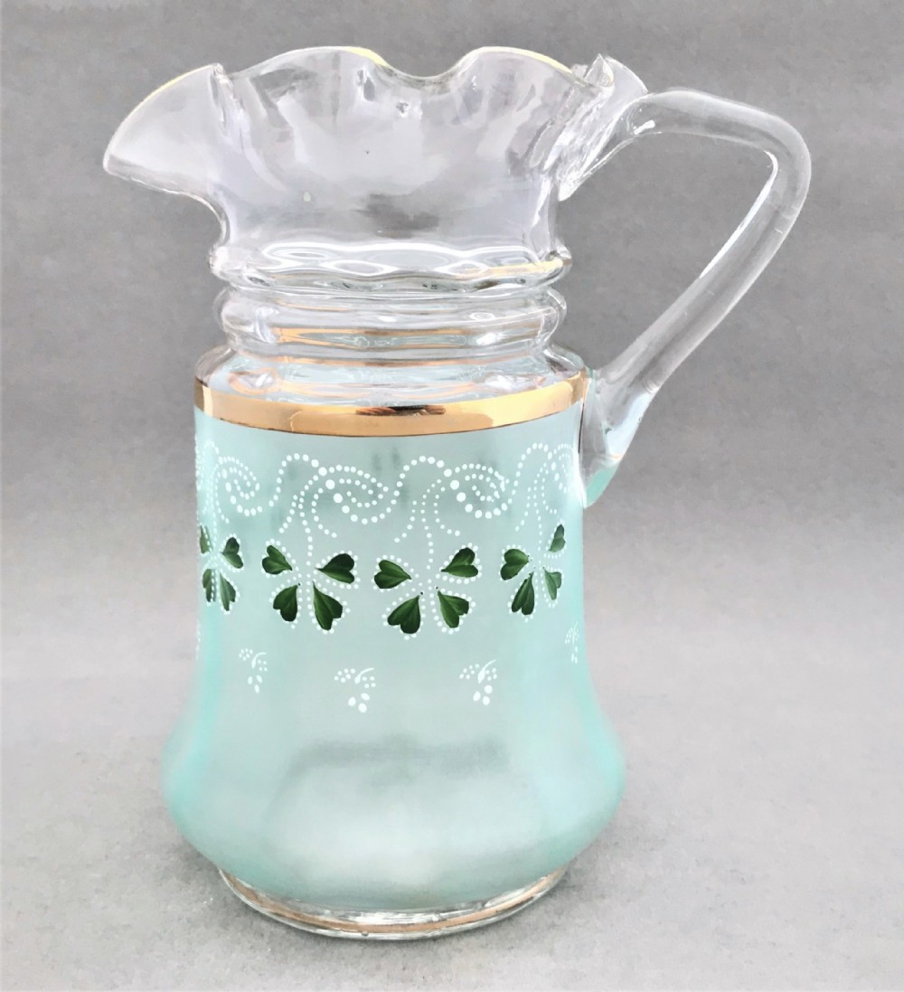An attractive enamelled Victorian water Jug