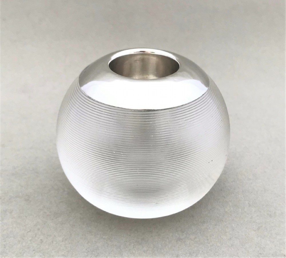 A silver mounted match striker