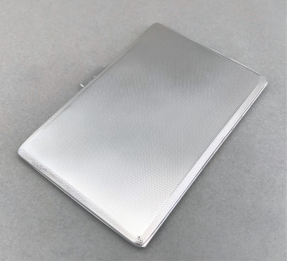 A handsome Art Deco silver cigarette case View II