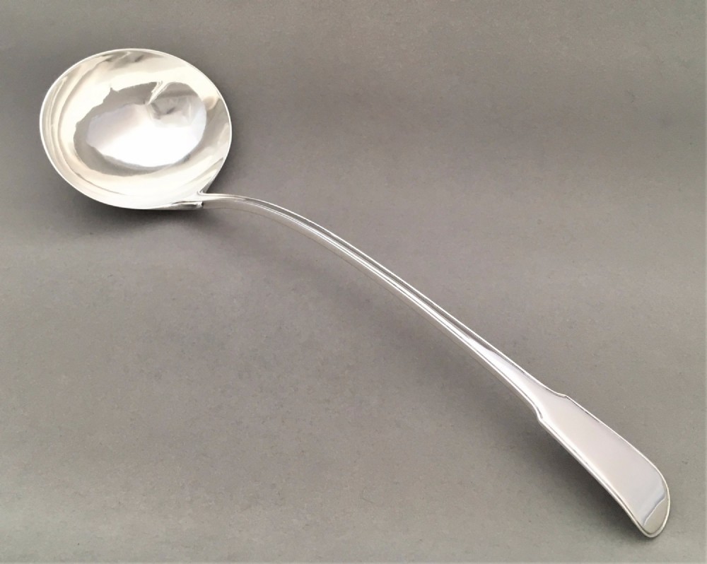 A rare 18th Century silver Fiddle & Thread soup ladle