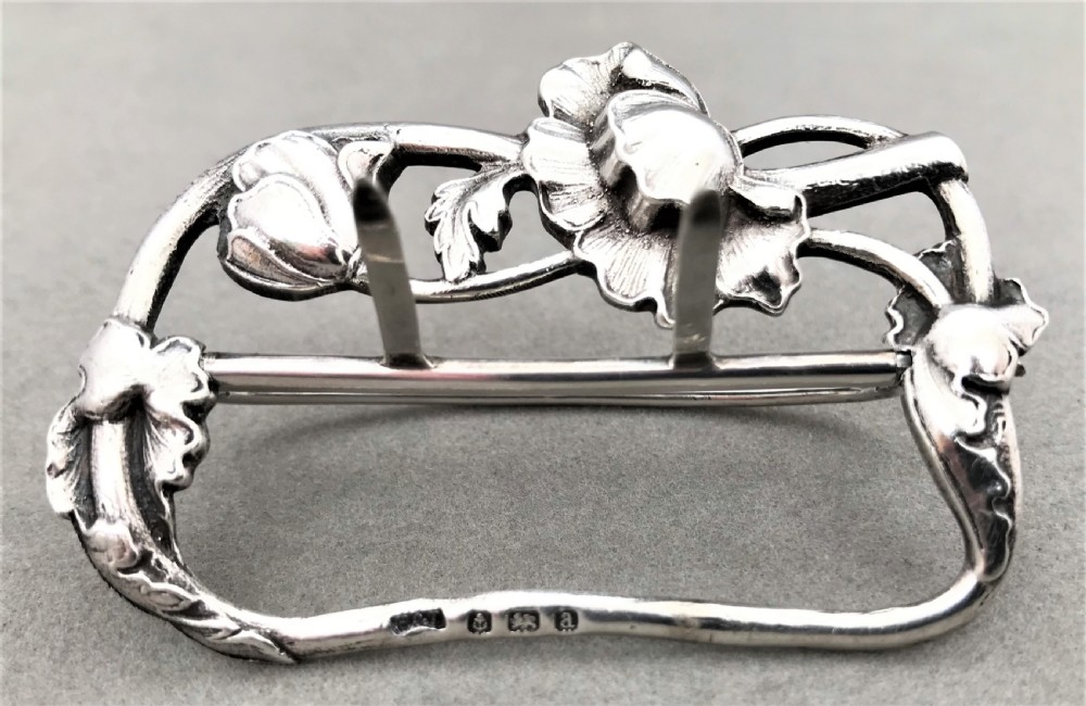 An exquisite cast silver belt buckle View VI