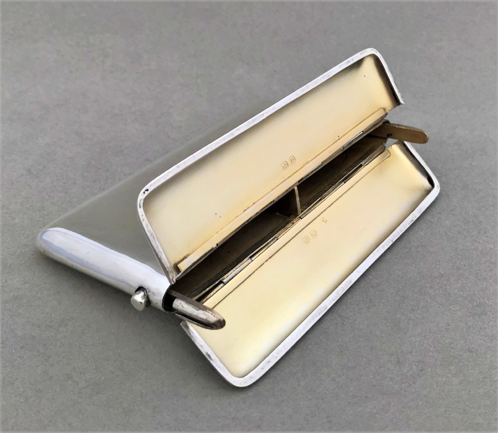 An unusual silver sprung card or cigarette case View V